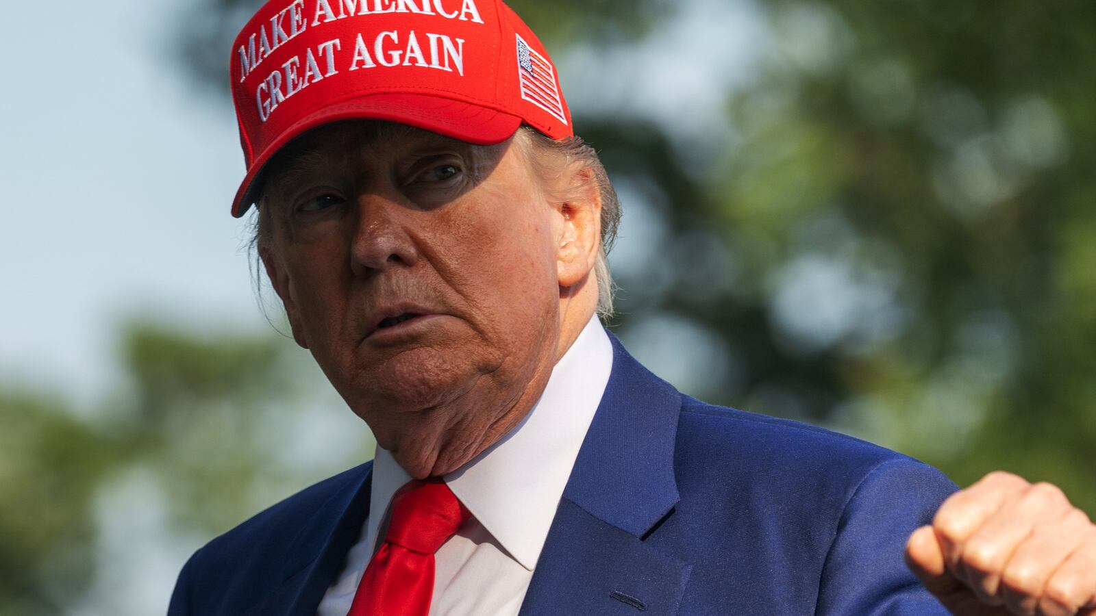 President Donald Trump raises his fist as he returns to the White House prior to the U.S. launching strikes on Iran on June 21.