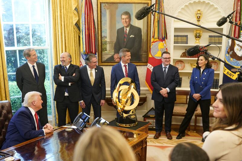 Michigan Governor Gretchen Whitmer speaks next to Michigan House Speaker Matt Hall, on the day U.S. President Donald Trump signs executive orders and proclamations, in the Oval Office at the White House in Washington, D.C., U.S., April 9, 2025. REUTERS/Nathan Howard