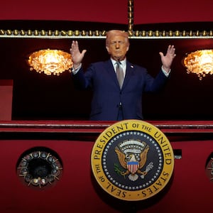 U.S. President Donald Trump looks down from the Presidential Box in the Opera House at the John F. Kennedy Center for the Performing Arts as he participates in a guided tour and leads a board meeting on March 17, 2025 in Washington, DC.