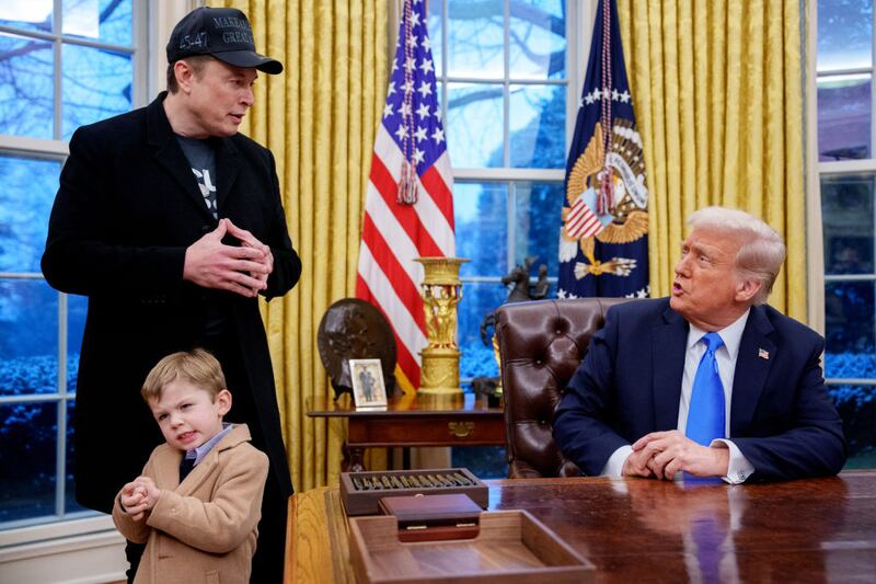President Donald Trump is joined by Tesla and SpaceX CEO Elon Musk, and his son, X, in the Oval Office.