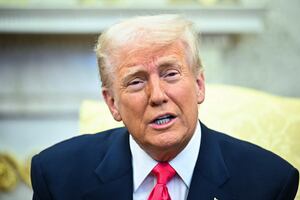 US President Donald Trump speaks to reporters.
