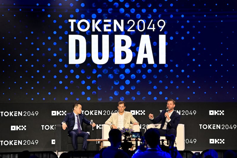 The Trump Organization executive vice-president Eric Trump, World Liberty Financial co-founder Zach Witkoff and cryptomoney exchange Tron Justin Sun, participate in a session during the Token 2049 crypto conference in Dubai on May 1, 2025.