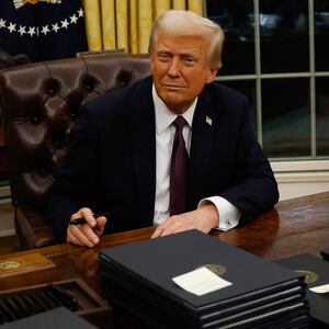 President Donald Trump signs executive orders in the Oval Office on January 20, 2025 in Washington, DC.