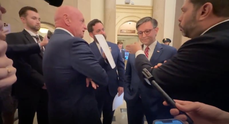 Mike Lawler and Ruben Gallego argue during the argument with Mike Johnson