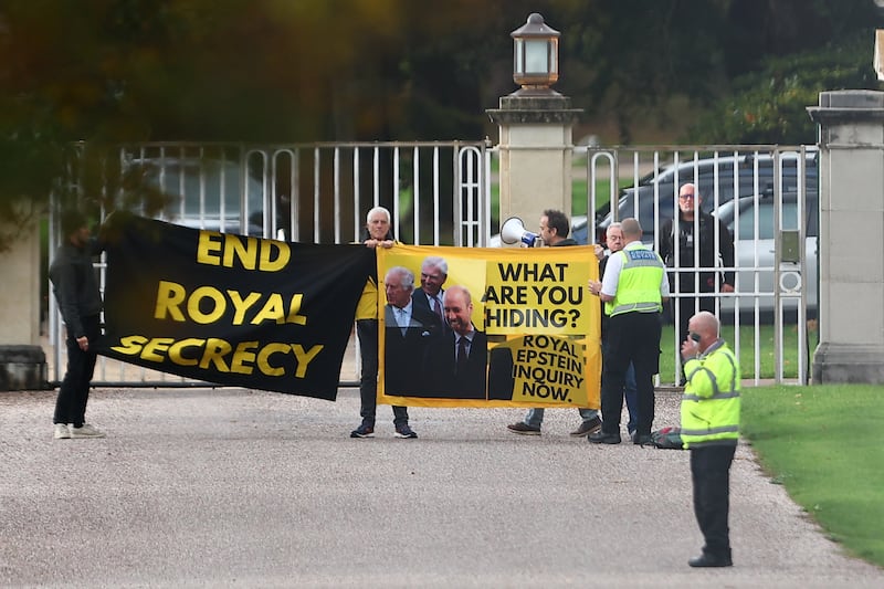 Activists from the anti-monarchy group Republic, stage a protest at the gates to royal lodge where Prince Andrew lives.