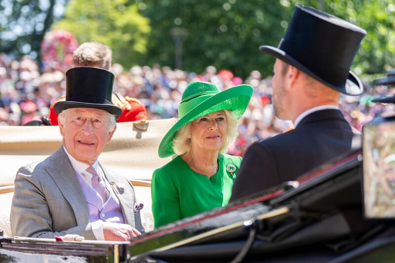 King Charles and Queen Camilla with Prince William arrive at Ascot.