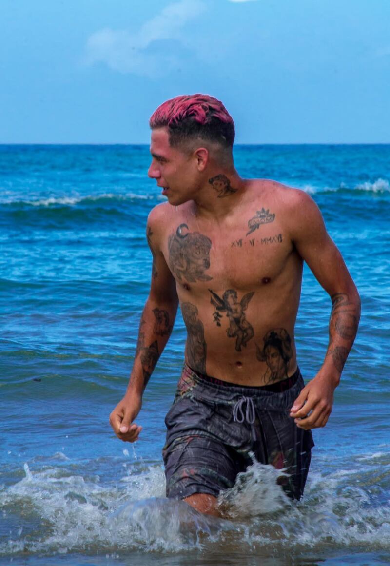Fitzgerealth De Jesus has a considerable number of tattoos—but his longtime tattoo artist attests that none of them are gang related.