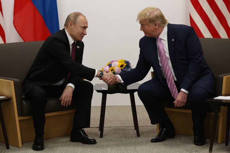 U.S. President Donald Trump (R) greets Russian President Vladimir Putin (L) during their bilateral meeting at the G20 Osaka Summit 2019, in Osaka, Japan, June,28, 2019.