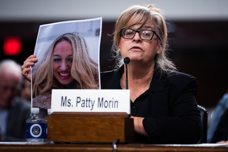 Patty Morin holds a picture of her daughter, Rachel, who was  killed by  undocumented immigrant in Maryland in 2023.