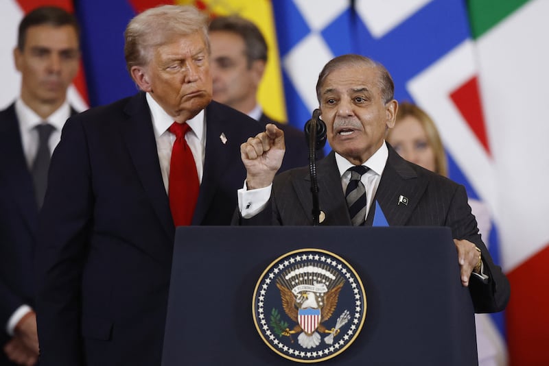 US President Donald Trump (C) listens to Pakistan's Prime Minister Shehbaz Sharif