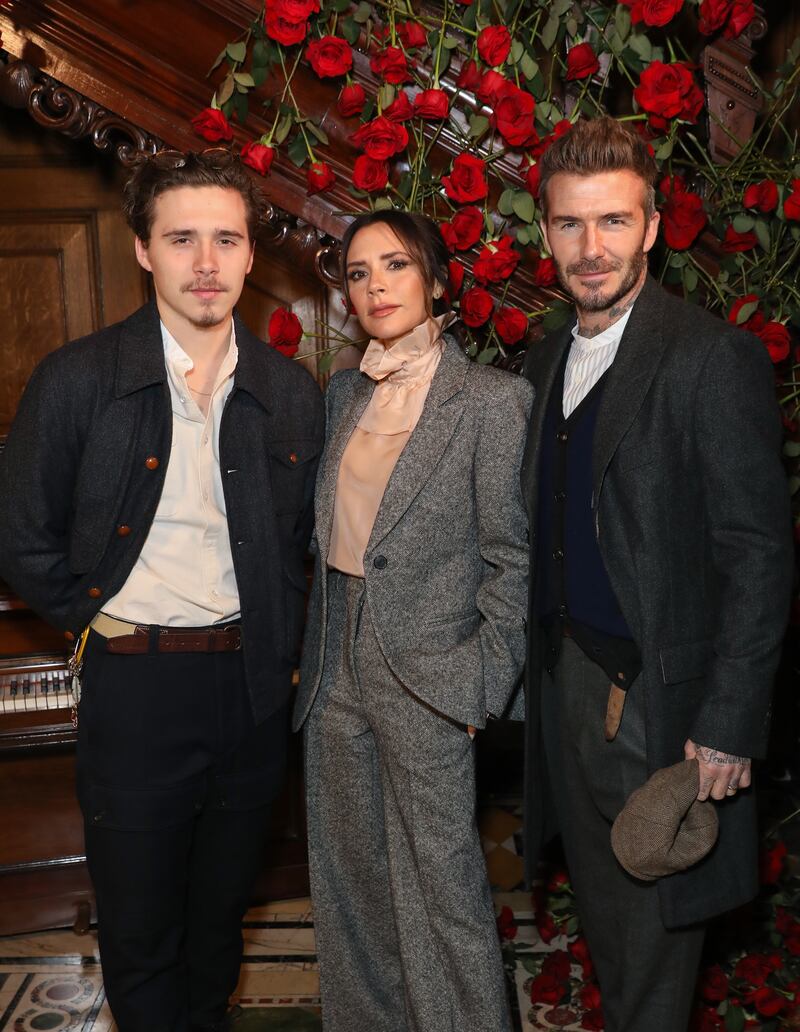 (L-R) Brooklyn, Victoria and David Beckham
