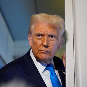 TOKYO, JAPAN - OCTOBER 29: U.S. President Donald Trump speaks to journalists aboard Air Force One en route to South Korea on October 29, 2025 in Japan. Trump is traveling to South Korea for the APEC meetings, following an appearance at the ASEAN summit in Malaysia, and a trip to Japan, where he called on Japanese Emperor Naruhito and new Prime Minister Sanae Takaichi. (Photo by Andrew Harnik/Getty Images)