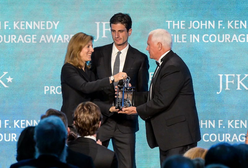 Caroline Kennedy Schlossberg and her son Jack Schlossberg present the 2025 John F. Kennedy Profile in Courage Award to former U.S. Vice President Mike Pence, "for putting his life and career on the line to ensure the constitutional transfer of presidential power on January 6, 2021," at the John F. Kennedy Presidential Library and Museum in Boston, Massachusetts, U.S., May 4, 2025.    REUTERS/Faith Ninivaggi