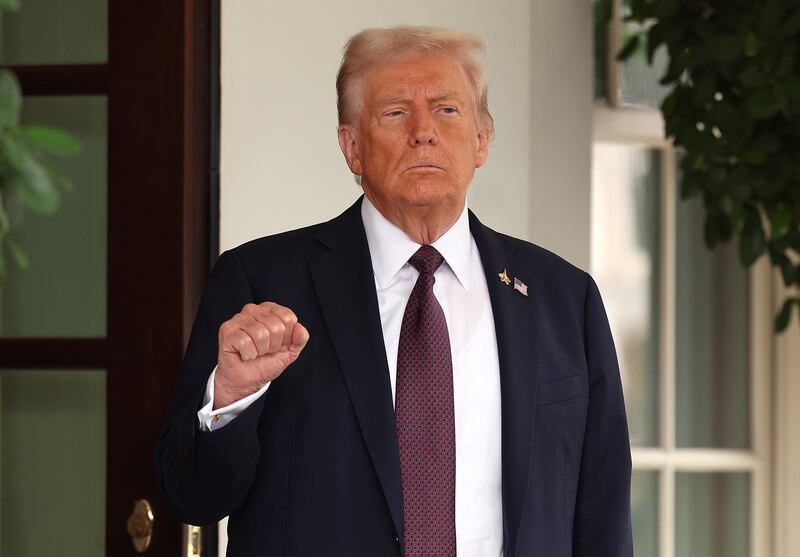 WASHINGTON, DC - SEPTEMBER 29: U.S. President Donald Trump pumps his first as he waits to welcome Israeli Prime Minister Benjamin Netanyahu at the White House on September 29, 2025 in Washington, DC. In what will be their fourth meeting in Washington, Trump and Netanyahu are expected to discuss the latest U.S. backed plans to end the war in Gaza and free the remaining hostages held by Hamas. (Photo by Win McNamee/Getty Images)