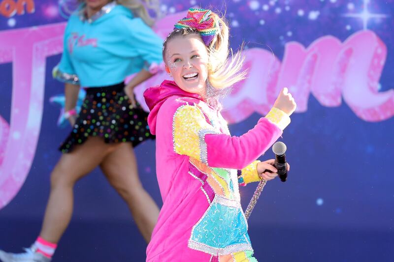 JoJo Siwa performs onstage during a drive-in screening and performance for the Paramount+ original movie "The J Team" in 2021