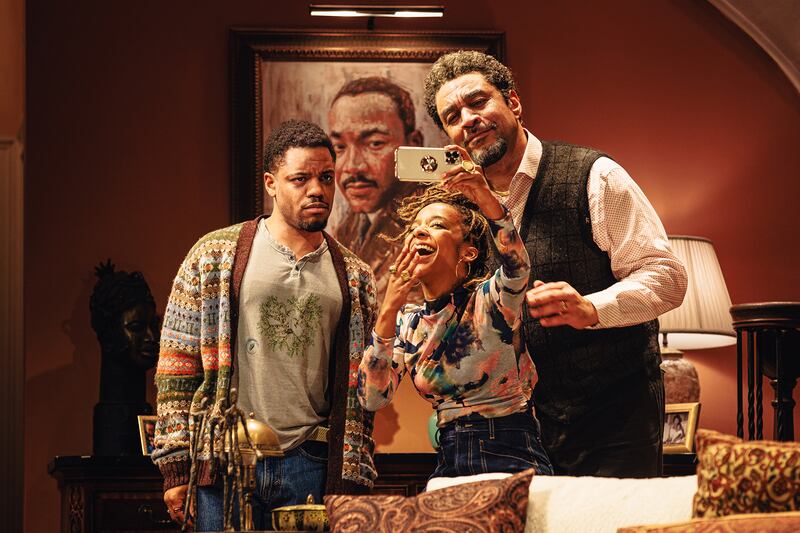 Jon Michael Hill, Kara Young, and Harry Lennix in Purpose.