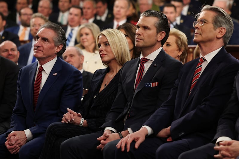 WASHINGTON, DC - MARCH 04: U.S. Secretary of the Interior Doug Burgum, Attorney General Pam Bondi, Secretary of Defense Pete Hegseth, and Treasury Secretary Scott Bessent listen as U.S. President Donald Trump address to a joint session of Congress at the U.S. Capitol on March 04, 2025 in Washington, DC.     Win McNamee/Pool via REUTERS