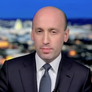 A split screen of Jesse Watters (left) interviewing Stephen Miller (right).