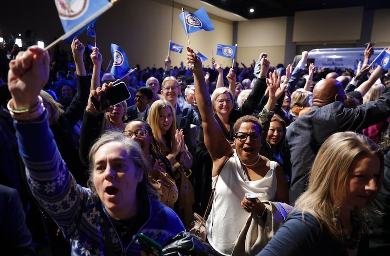 RICHMOND, VIRGINIA - NOVEMBER 04: Supporters celebrate during the election night watch party for Virginia Democratic gubernatorial candidate, former Rep. Abigail Spanberger as she is projected to win the race at the Greater Richmond Convention Center on November 04, 2025 in Richmond, Virginia. Spanberger defeated Republican gubernatorial candidate Lieutenant Gov. Winsome Earle-Sears to become the first female governor in the commonwealth’s history in an election that was seen as a national political bellwether leading into the midterms.