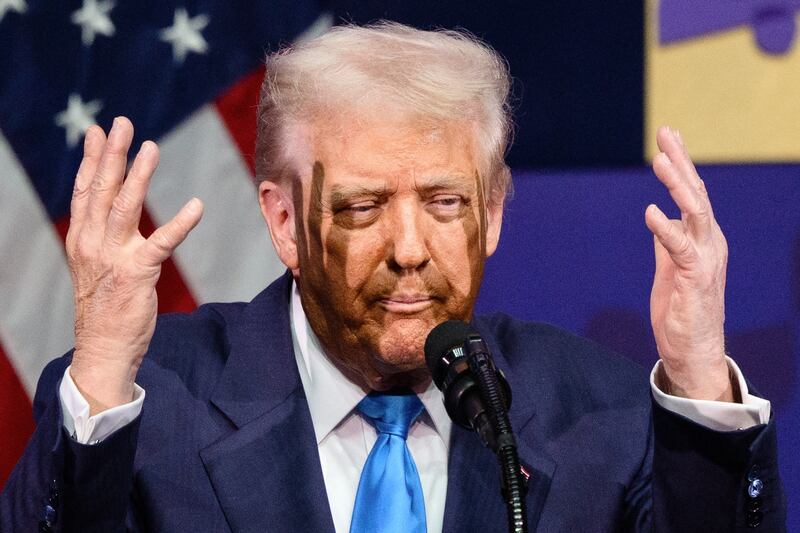 TOPSHOT - US President Donald Trump gestures as he speaks during the Asia-Pacific Economic Cooperation (APEC) CEO Summit at the Gyeongju Arts Center in Gyeongju on October 29, 2025. (Photo by ANTHONY WALLACE / AFP) (Photo by ANTHONY WALLACE/AFP via Getty Images)