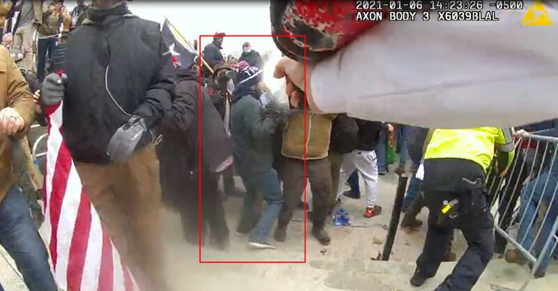 The moment when U.S. Capitol Police officers were hit with with bear spray on Jan. 6, 2021.