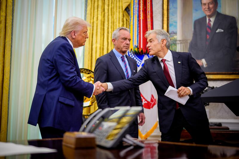 Dr. Mehmet Oz, Robert F. Kennedy Jr. and Donald Trump during Oz's swearing in ceremony.