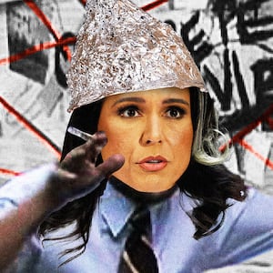 Tulsi Gabbard wearing a tinfoil hat as the Charlie Cox meme from It's Always Sunny in Philadelphia holding an obama russia hoax conspiracy theory graphic