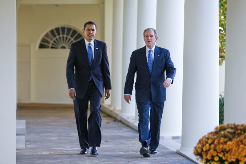 President Bush walks with President-elect Barack Obama down the Colonnade of the White House in Washington, to the Oval Office. (Photo by Brooks Kraft LLC/Corbis via Getty Images)