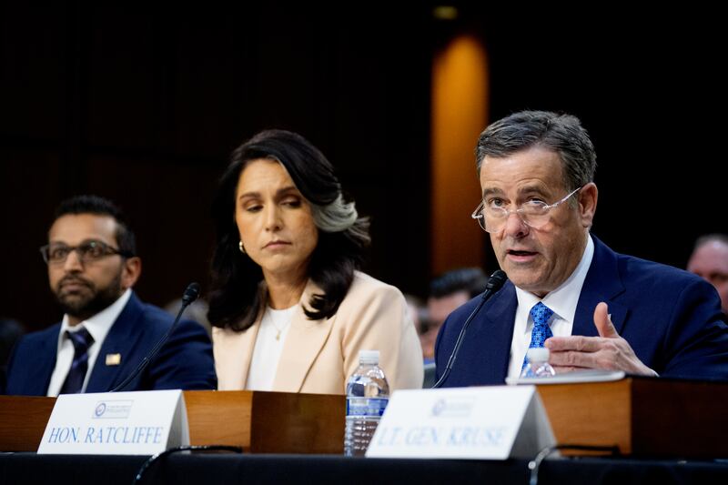 Central Intelligence Agency Director John Ratcliffe, accompanied by FBI Director Kash Patel, and Director of National Intelligence Tulsi Gabbard, speaks during a Senate Committee on Intelligence Hearing on March 25, 2025 in Washington, D.C.