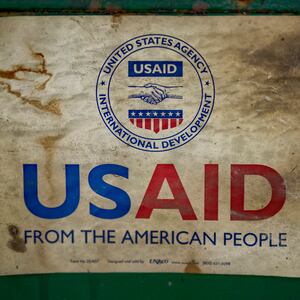 MANILA, PHILIPPINES - MARCH 10: The USAID logo is seen on a machine that processes recycled plastic into construction blocks at the Pasig Eco Hub, a project impacted by the Trump administration's freeze on foreign aid, on March 10, 2025 in Pasig, Metro Manila, Philippines.