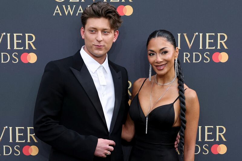 Nicole Scherzinger and Tom Francis attend the Olivier Awards at the Royal Albert Hall in London, Britain, April 14, 2024.