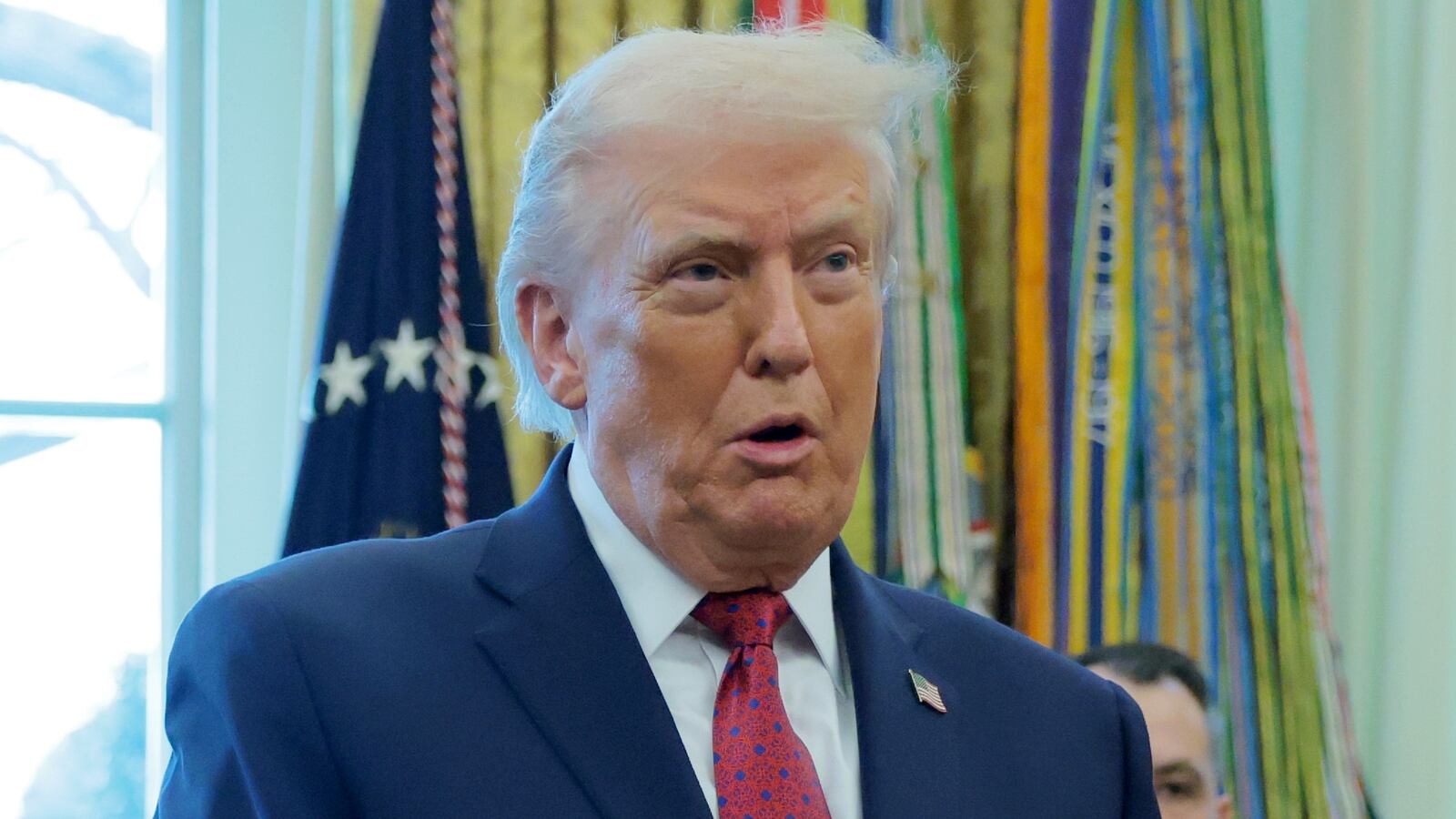 U.S. President Donald Trump speaks during a ceremony for the presentation of the Mexican Border Defense Medal in the Oval Office of the White House on December 15, 2025 in Washington, DC.