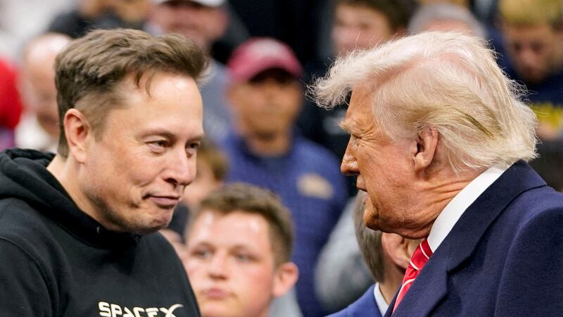 Tesla CEO Elon Musk greets U.S. President Donald Trump. Now Musk is frontrunner to build Trump's 'Golden Dome.'