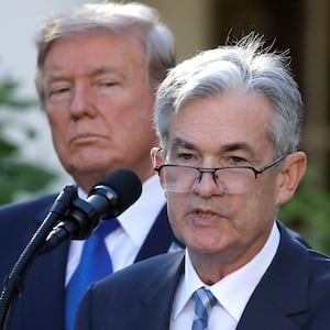 FILE PHOTO: U.S. President Donald Trump looks on as Jerome Powell, his nominee to become chairman of the U.S. Federal Reserve, speaks at the White House in Washington, U.S., November 2, 2017. REUTERS/Carlos Barria/File Photo