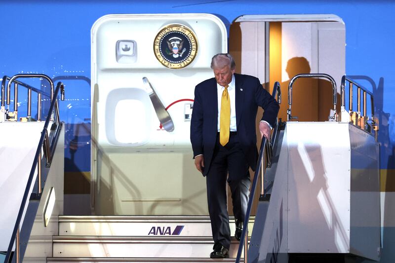 President Donald Trump disembarks Air Force One as he arrives at Haneda Airport on October 27, 2025 in Tokyo, Japan.