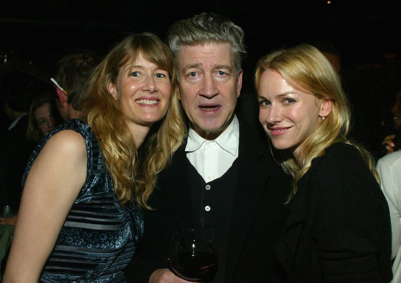 Laura Dern and Naomi Watts pose with director David Lynch in 2005.
