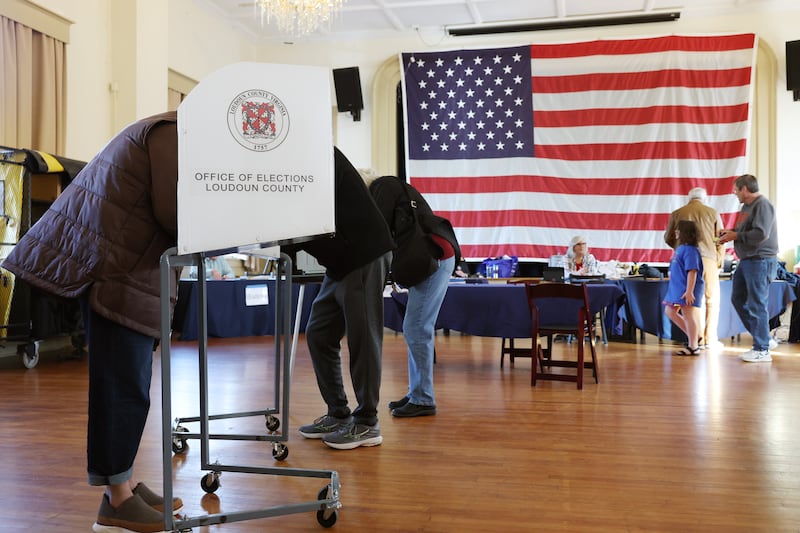 Voters fill out their ballots at a polling station in the Hillsboro Old Stone School on November 04, 2025 in Hillsboro, Virginia. Virginians are voting in a series of state contests including for governor and attorney general.