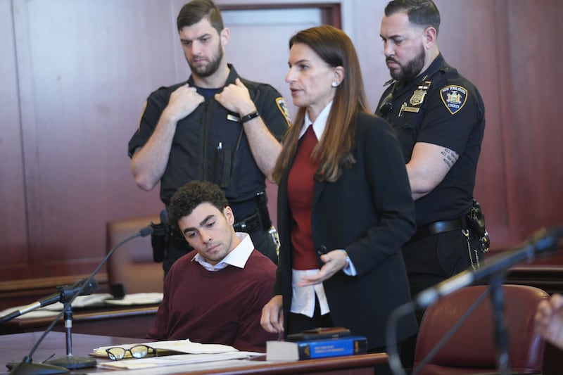 NEW YORK, NEW YORK - DECEMBER 23:  Luigi Mangione appears with his attorney Karen Friedman Agnifilo for his arraignment at Manhattan Criminal Court on December 23, 2024 in New York City. Mangione, 26, was arraigned on state murder charges in the killing of UnitedHealthcare CEO Brian Thompson on a Manhattan street on December 4.