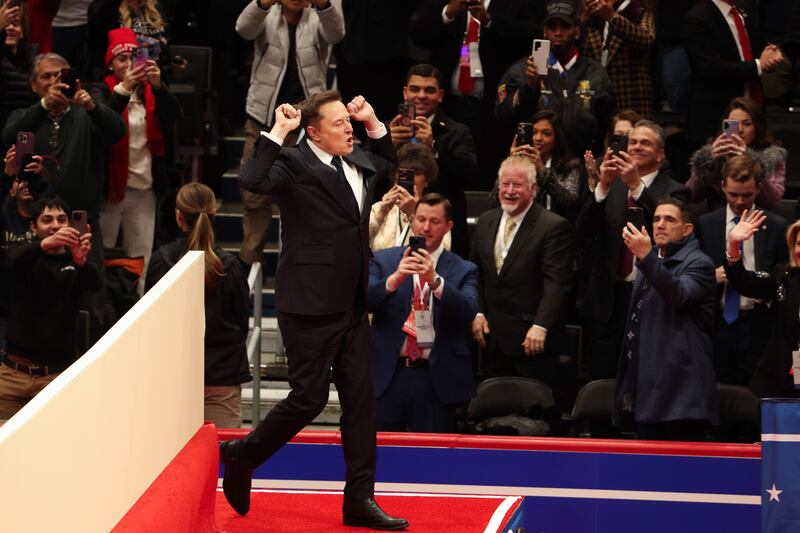 Elon Musk walks on stage to speak during an Inauguration Day event at Capital One Arena on January 20, 2025 in Washington, D.C.