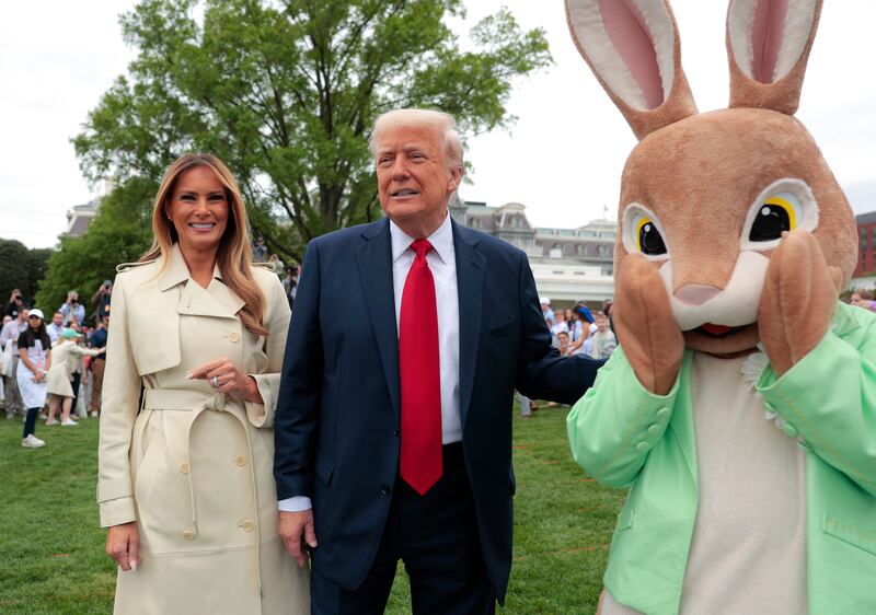 WASHINGTON, DC - APRIL 21: U.S. President Donald Trump, first lady Melania Trump and the Easter Bunny greet guests durning the White House Egg Roll on the South Lawn of the White House on April 21, 2025 in Washington, DC. The White House is expecting thousands of children and adults to participate in the annual tradition of rolling colored eggs down the White House lawn, which was started by President Rutherford B. Hayes in 1878. (Photo by Anna Moneymaker/Getty Images)