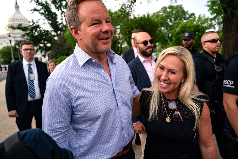 WASHINGTON, DC - MAY 8: Rep. Marjorie Taylor Greene (R-GA), and her boyfriend Brian Glenn a host at the conservative Right Side Broadcasting Network, walk together after she and Rep.