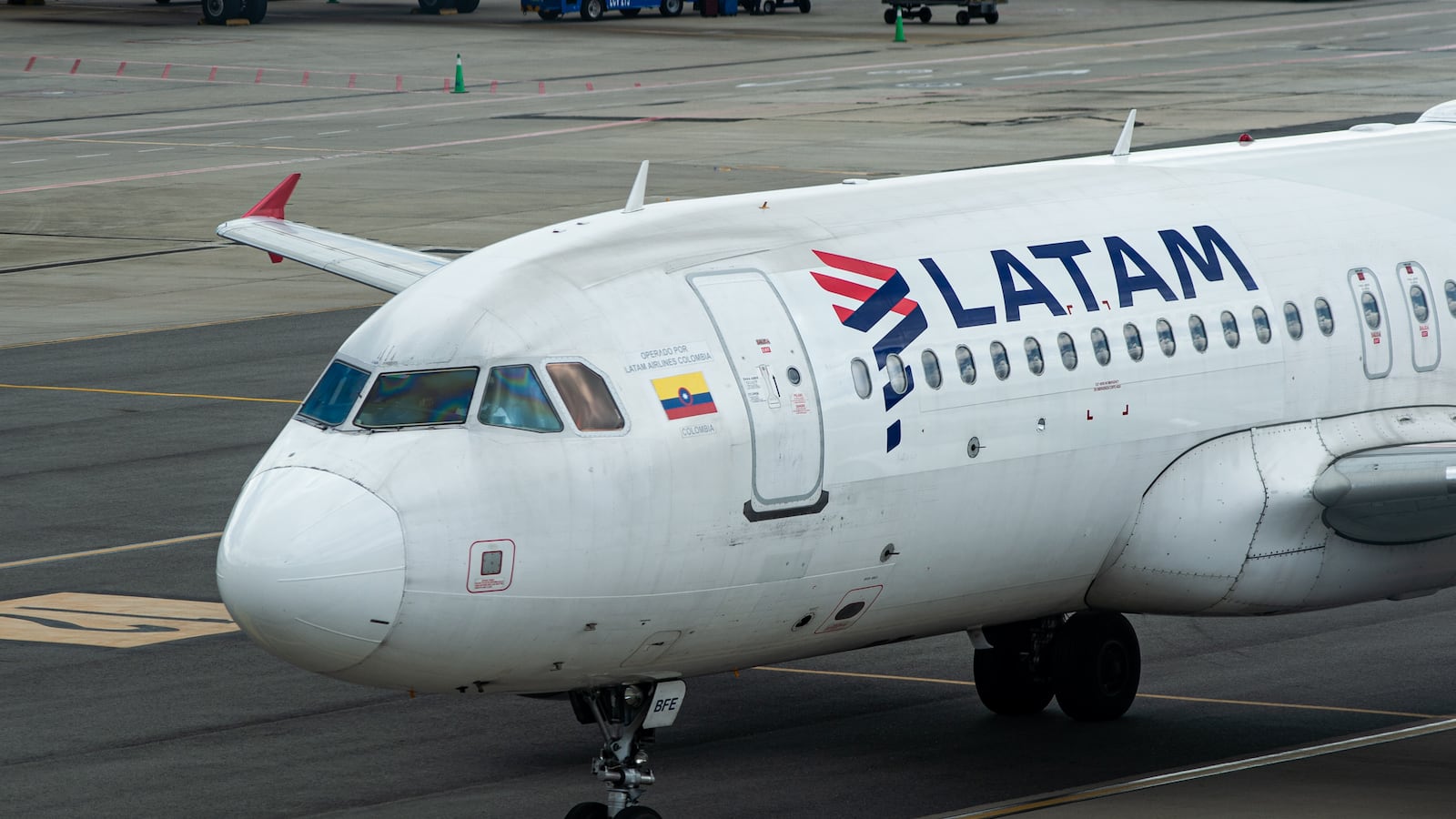 A LATAM Airbus a320 is seen on a taxi road at Bogota's El Dorado International Airport in Colombia, July 28, 2023. (Photo by: Sebastian Barros/Long Visual Press/Universal Images Group via Getty Images)
