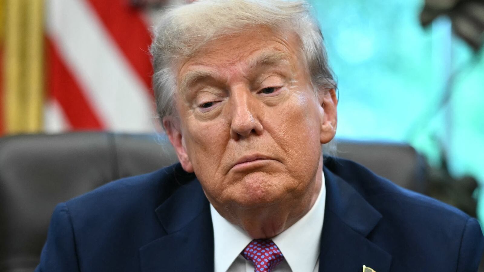President Donald Trump speaks to reporters after signing executive orders in the Oval Office of the White House in Washington, DC on September 5, 2025.