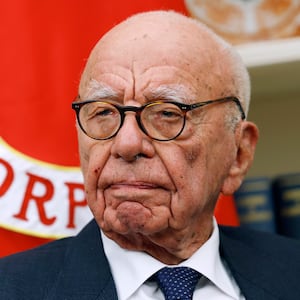 Former Executive Chairman of Fox Corp Rupert Murdoch listens as U.S. President Donald Trump speaks to reporters in the Oval Office of the White House on February 03, 2025 in Washington, DC.