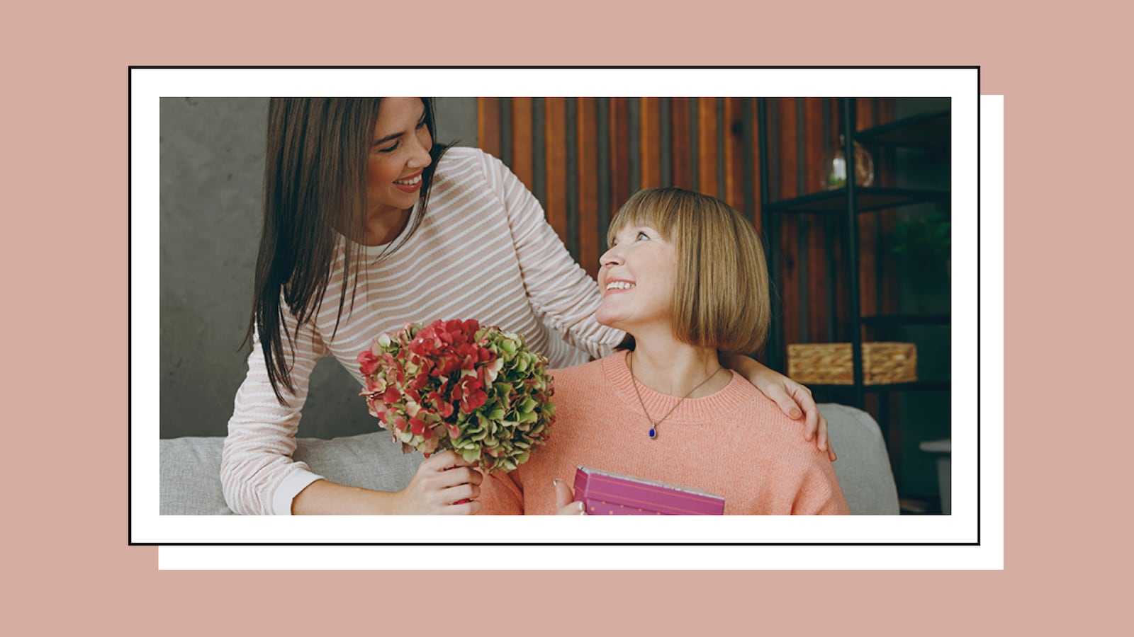 Daughter gifting mother flowers and jewelry for Mother's Day