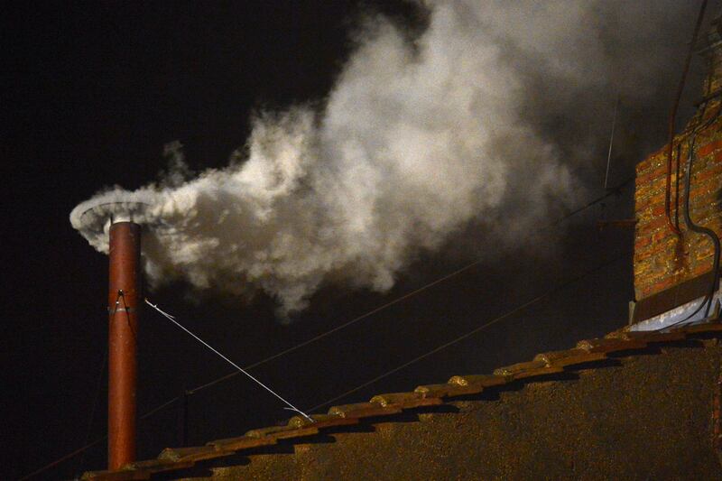 White smoke rising from the Sistine Chapel at the Vatican indicates a new pope has been elected and that a conclave is complete. Worldwide celebrations by Catholics follow.