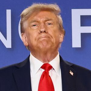 U.S. President Donald Trump attends a press conference following his meeting with Russian President Vladimir Putin to negotiate an end to the war in Ukraine, at Joint Base Elmendorf-Richardson, in Anchorage, Alaska, U.S., August 15, 2025.